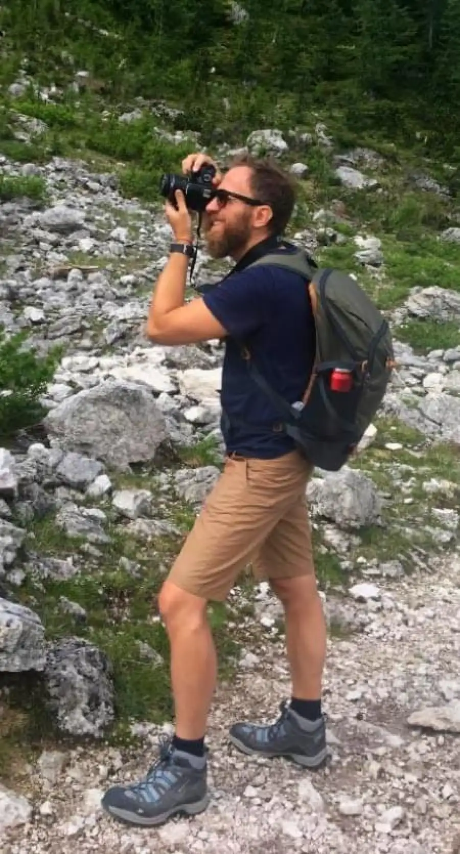 Taking a photo while hiking in the mountains