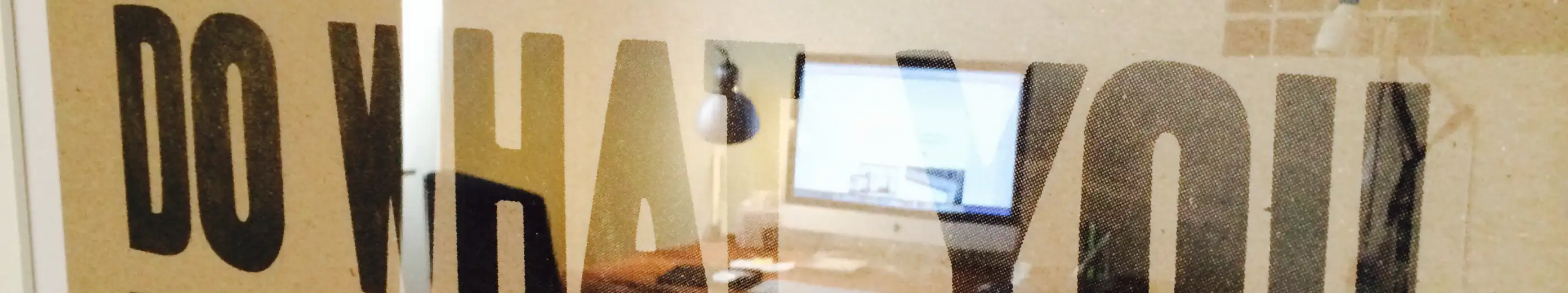 A working desk reflected in a picture